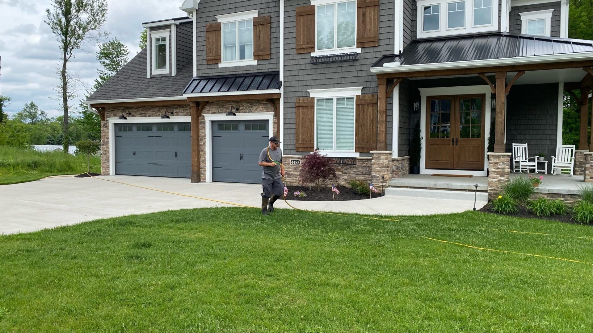 Greener Grass specialist applying targeted weed spraying in Green, OH, exemplifying the company's dedication to maintaining weed-free lawns and enhancing the overall beauty of the Green community's outdoor spaces.